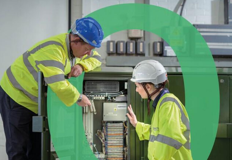 Openreach engineers servicing cabinet