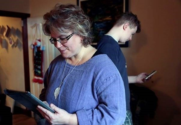 Image of people using devices